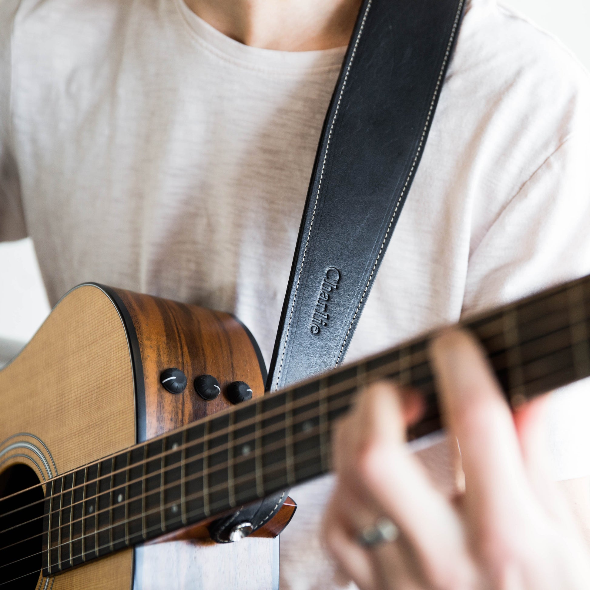 Personalized fine leather guitar strap. Available in black or brown leather.