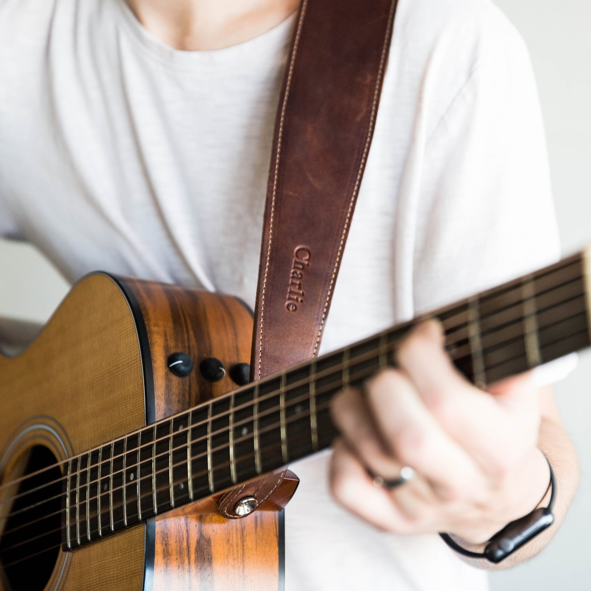 Personalized fine leather guitar strap. Available in black or brown leather.