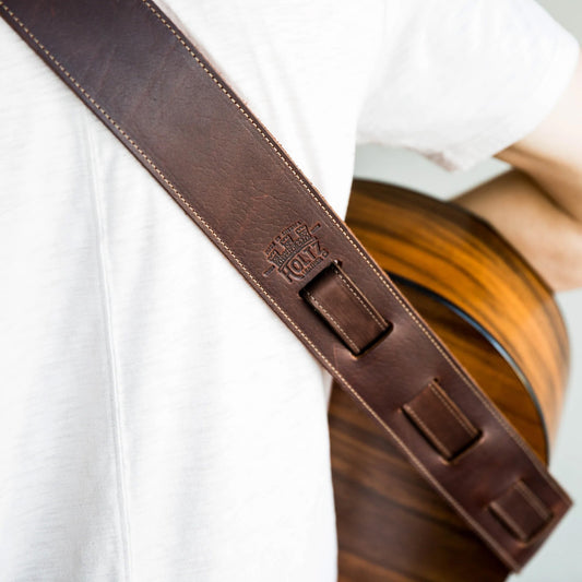 Personalized fine leather guitar strap. Available in black or brown leather.