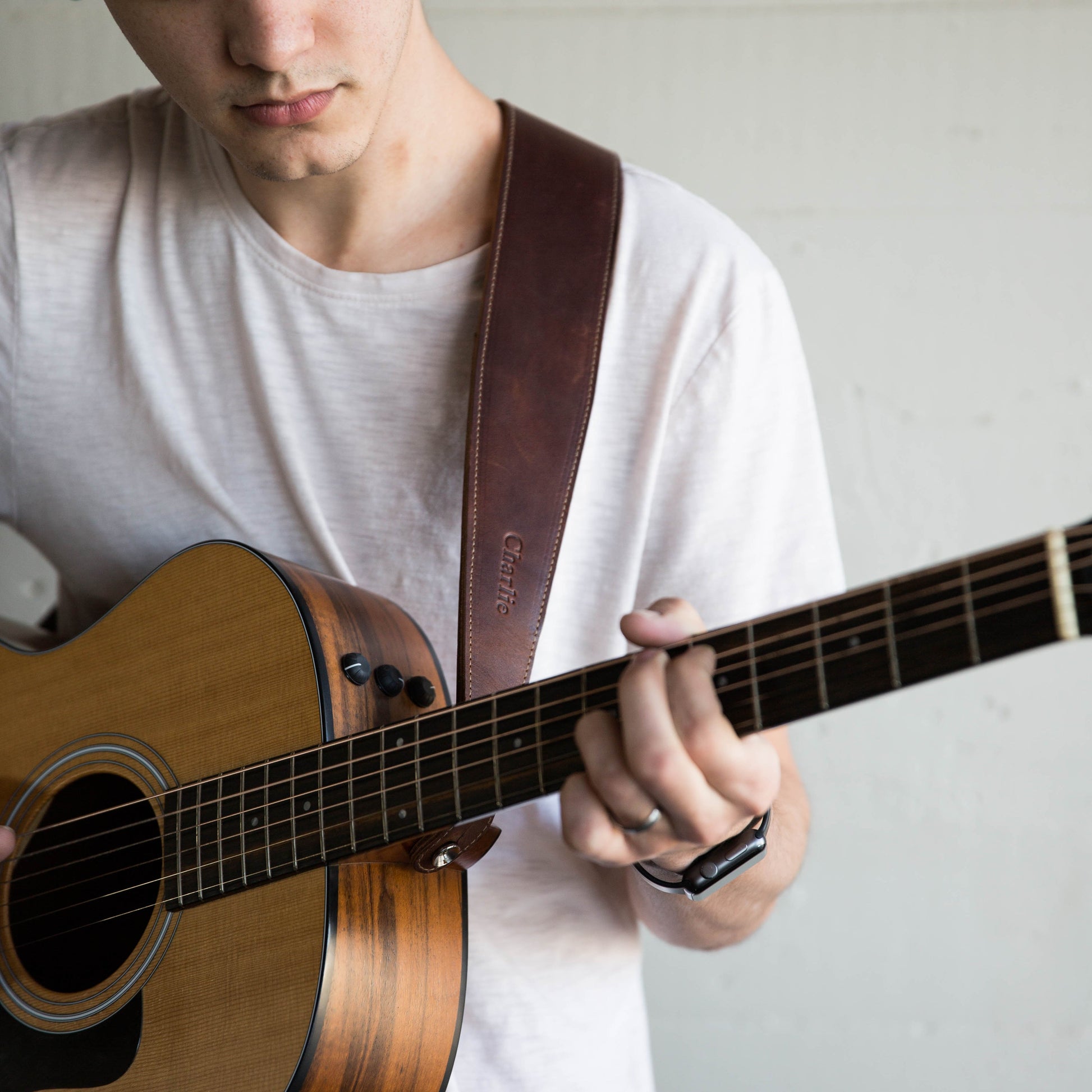 Personalized fine leather guitar strap. Available in black or brown leather.
