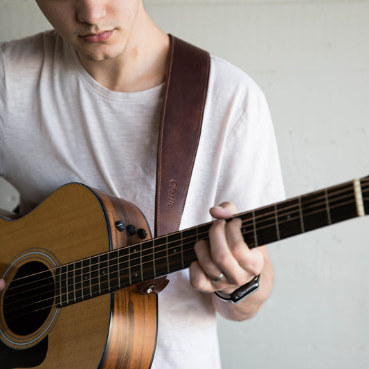 Personalized fine leather guitar strap. Available in black or brown leather.