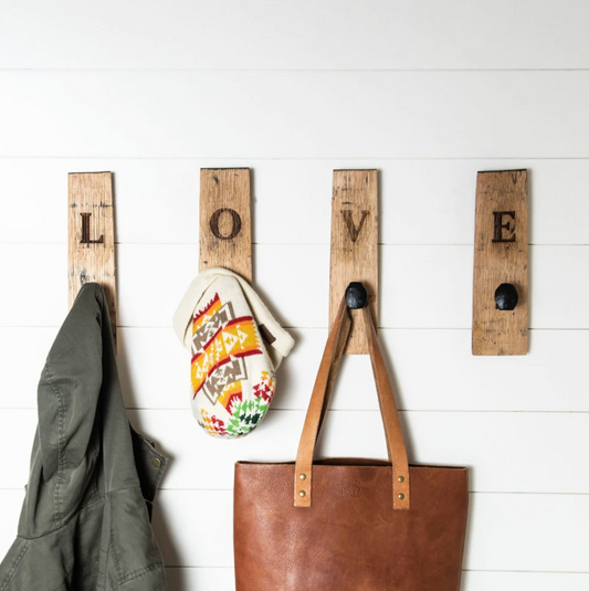 Wall hangers made of Tennessee Whiskey Barrel wood with personalized letters